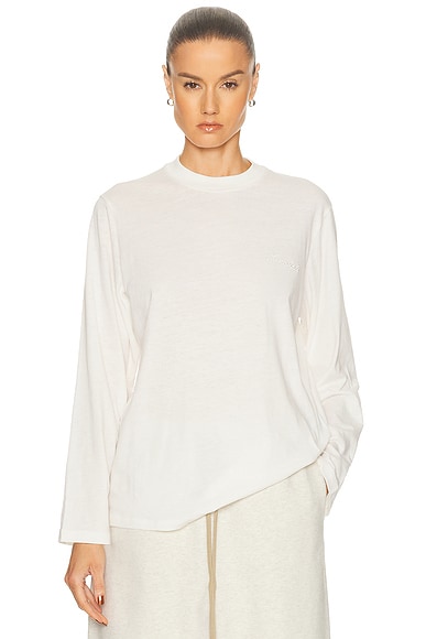 Fear of God ESSENTIALS Classic Fit Long Sleeve Tee in Ivory - Ivory. L also in XXS, XS