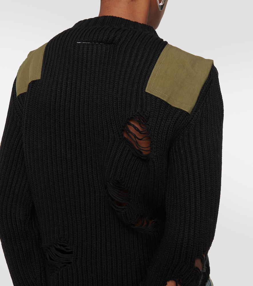 Distressed cotton and wool sweater