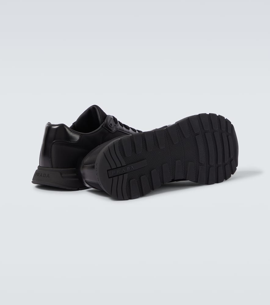 Logo leather-trimmed sneakers