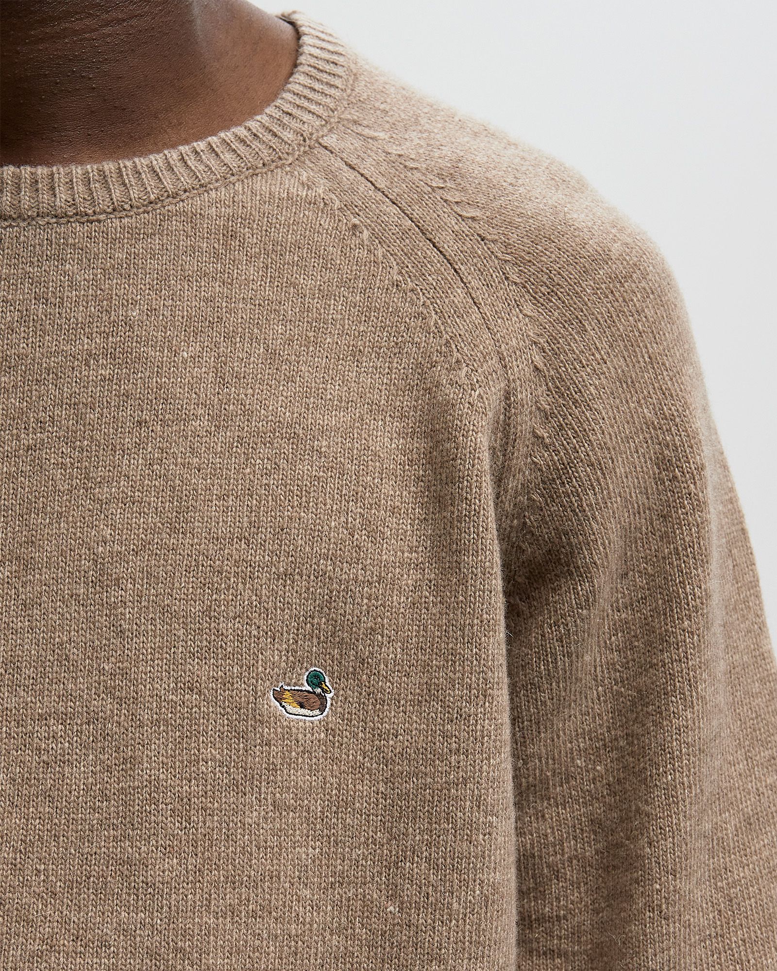 DUCK PATCH SWEATER beige male Pullovers now available at BSTN