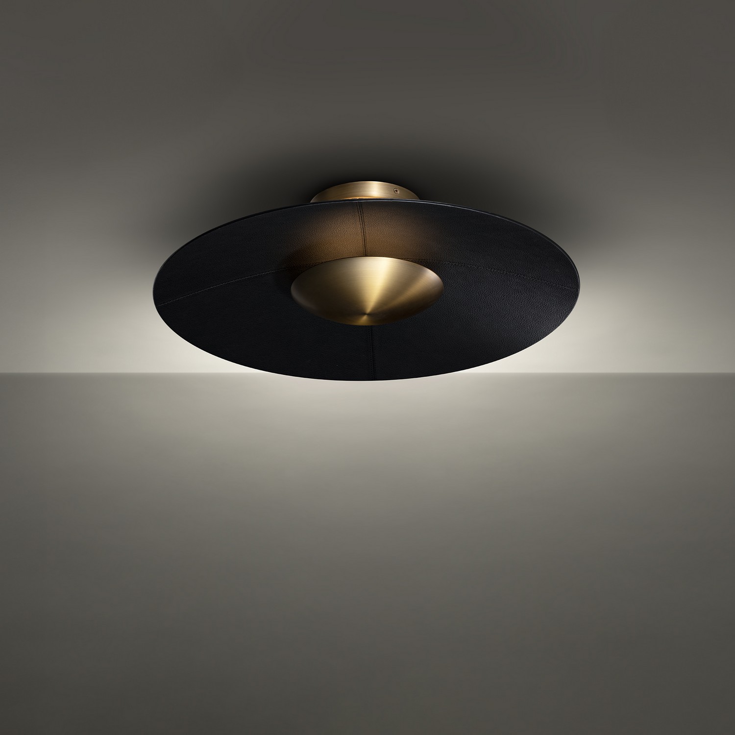Black Aged Brass LED Flush Mount from the Brody Collection