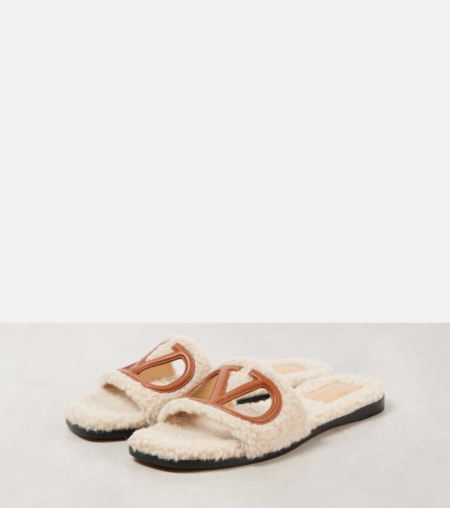 Valentino Garavani VLogo cutout faux shearling slides
