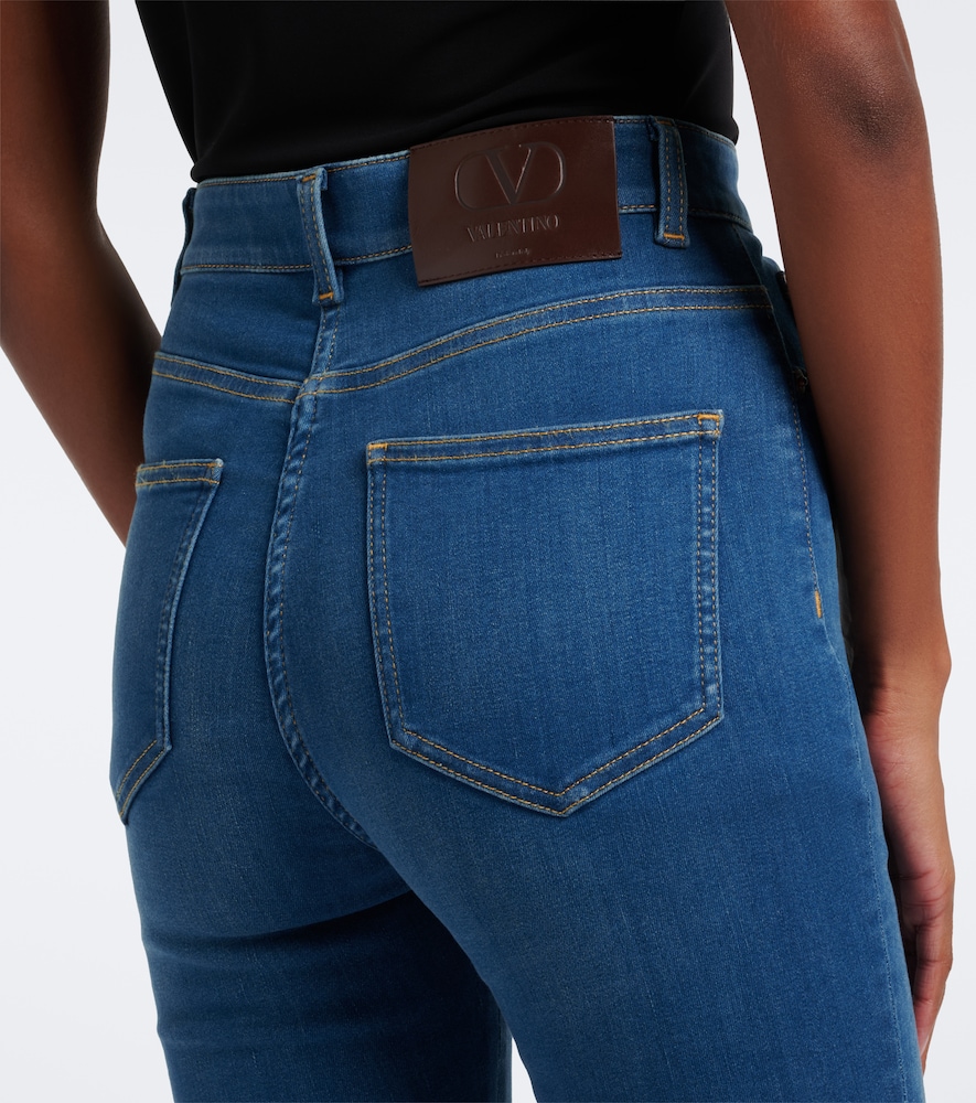 Lace-trimmed skinny jeans