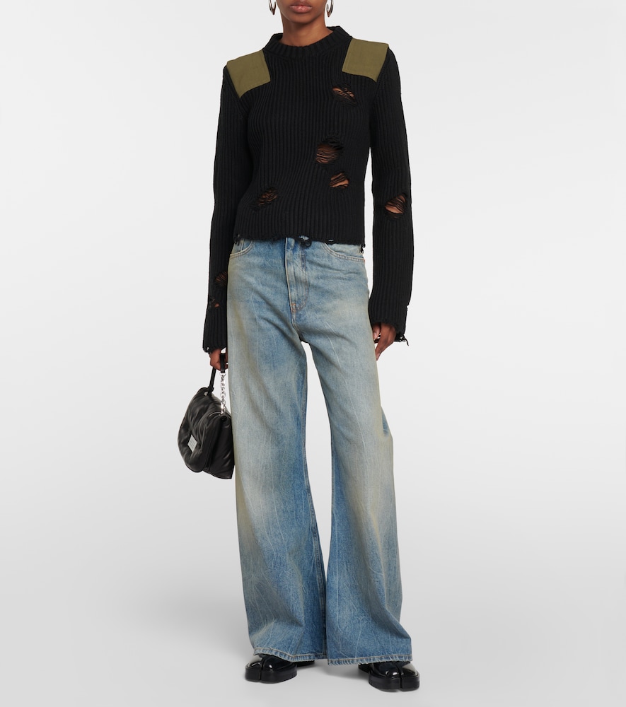 Distressed cotton and wool sweater