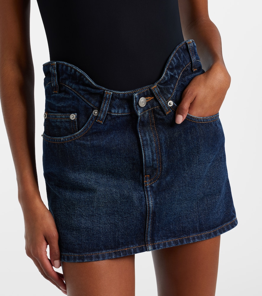 Curved denim miniskirt