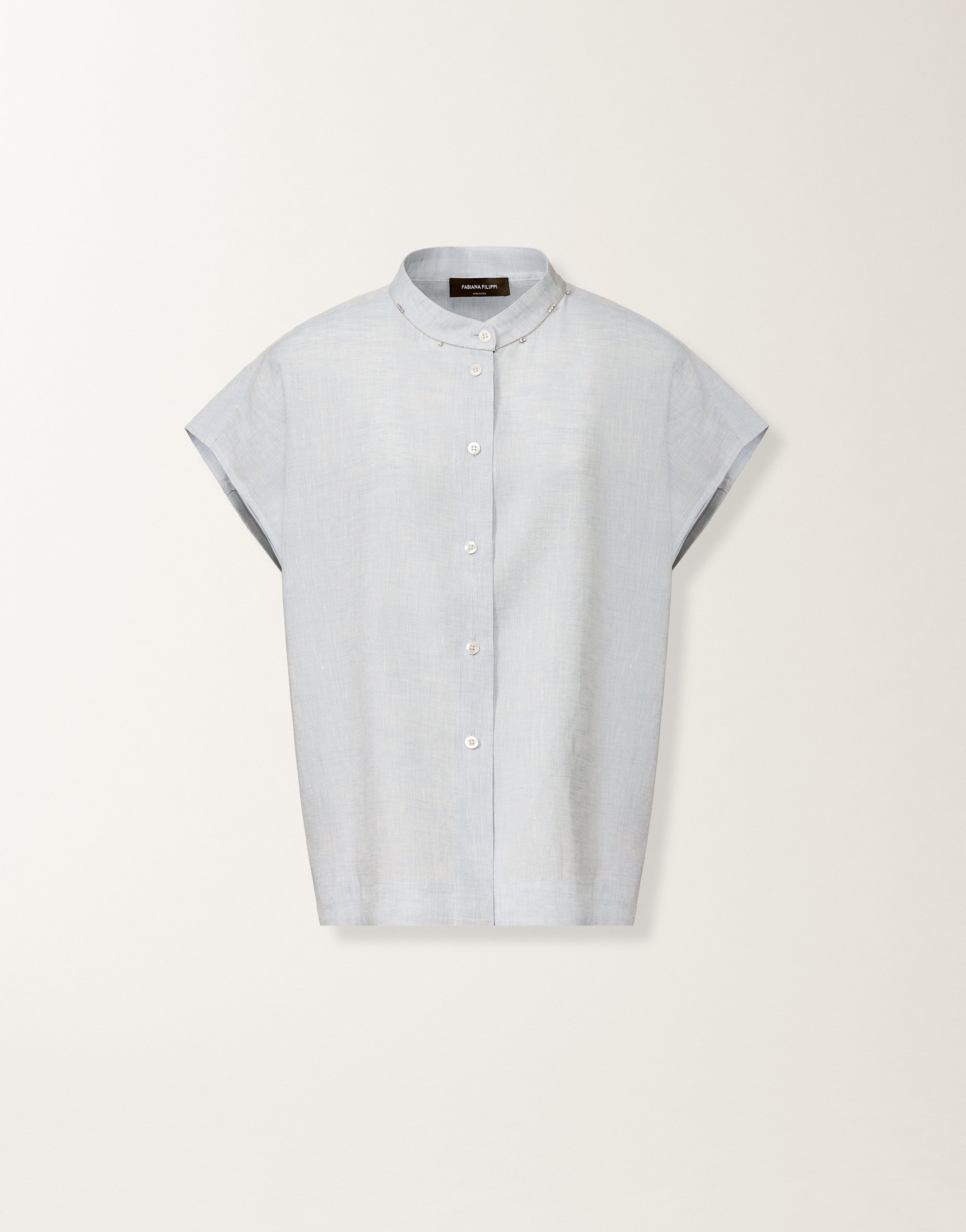 Sleeveless shirt in sky-blue linen fabric