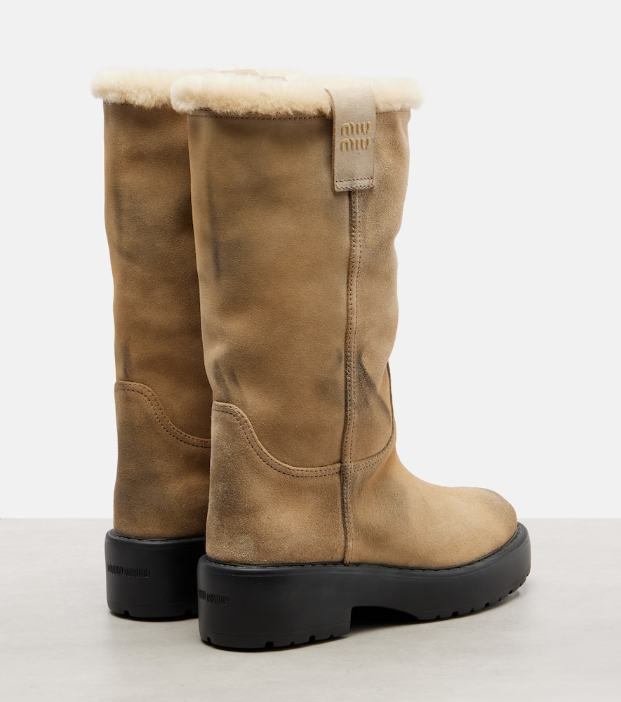 Shearling-lined suede knee-high boots