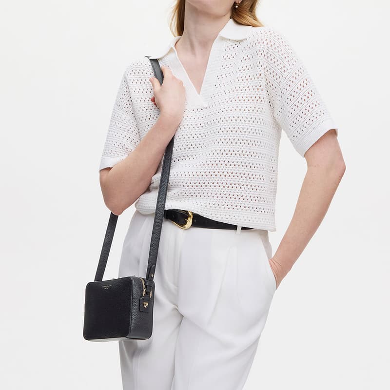 The Camera Crossbody Bag in Black Pebble with Webbing Strap