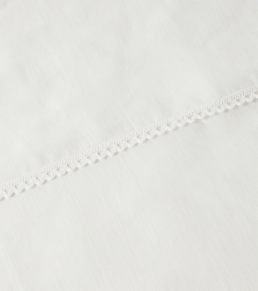 Lace-trimmed tablecloth