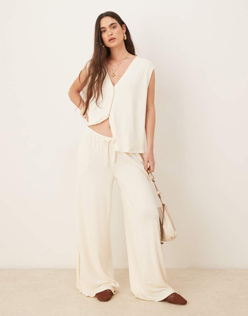 ASOS DESIGN textured knit wide leg pants in cream-White
