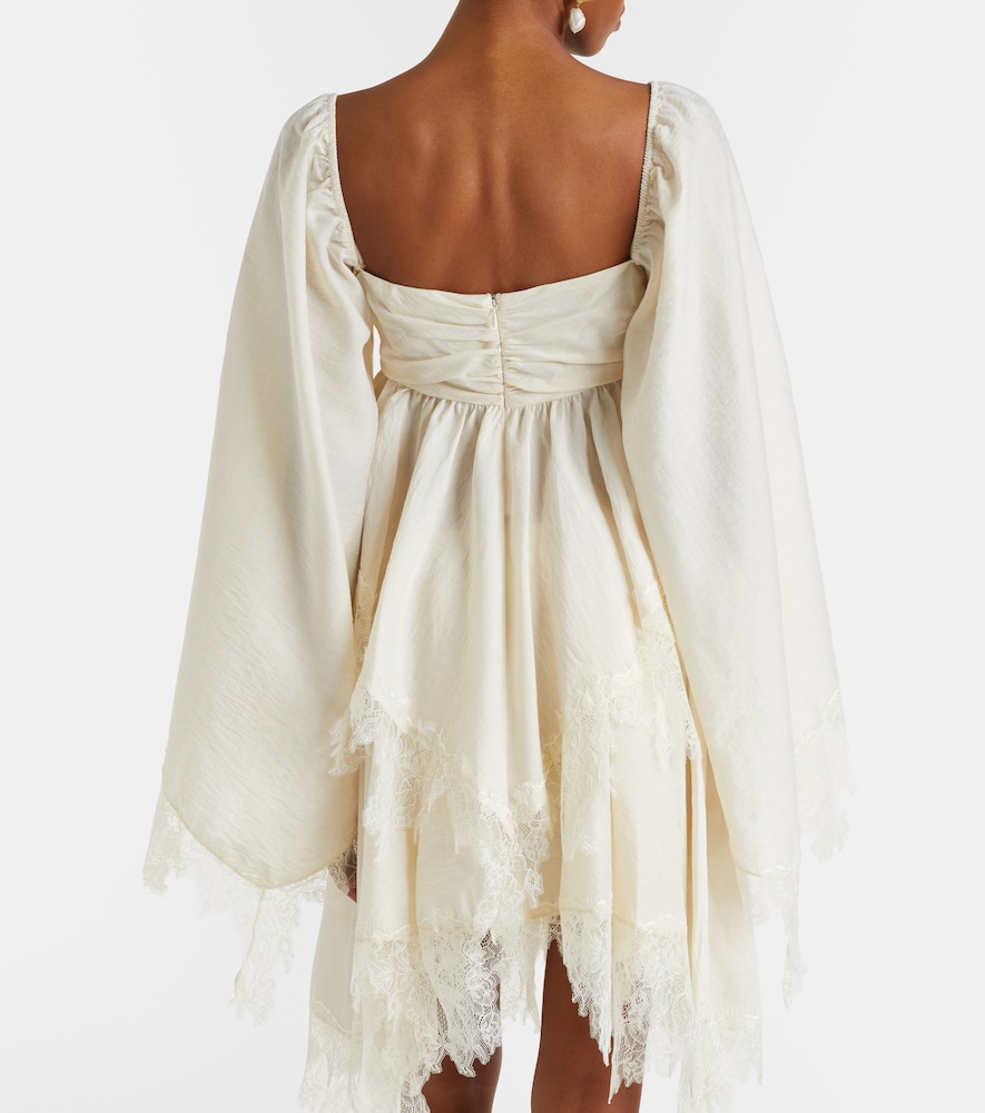 Embroidered lace-trimmed blouse