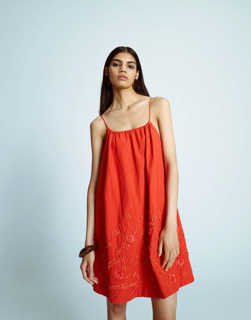 Trapeze swing mini dress with raffia embroidery in red