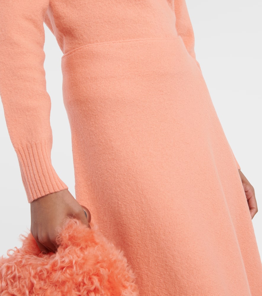 High-rise asymmetric wool midi skirt