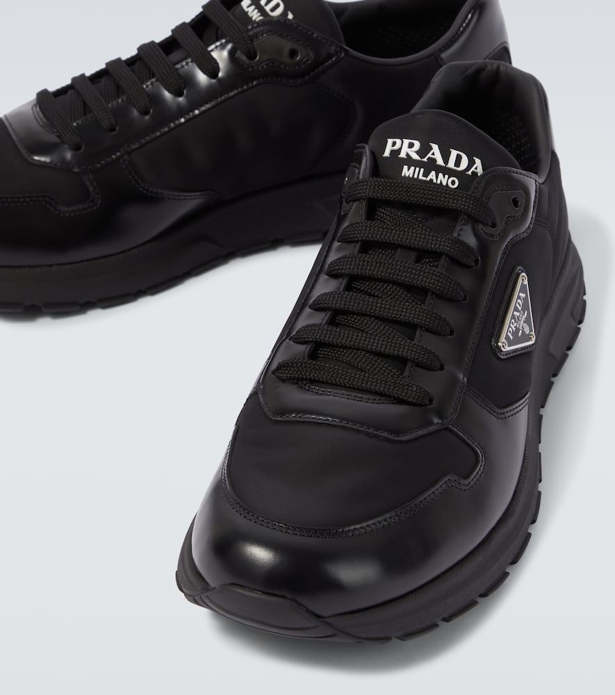 Logo leather-trimmed sneakers