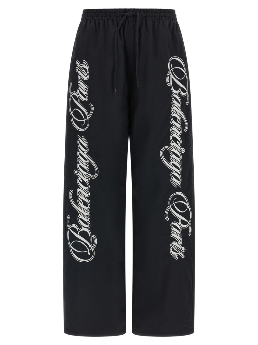 Balenciaga - reversible trousers featuring cursive motif design