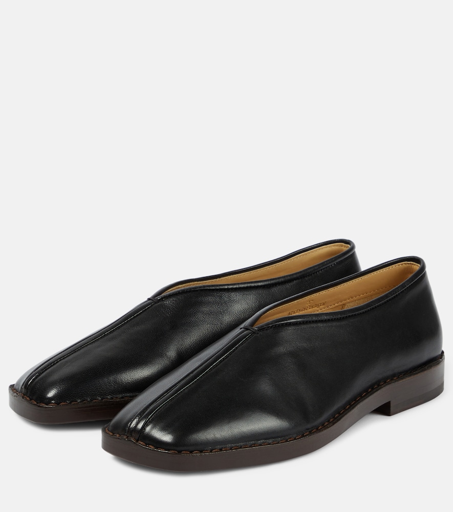 Piped leather loafers