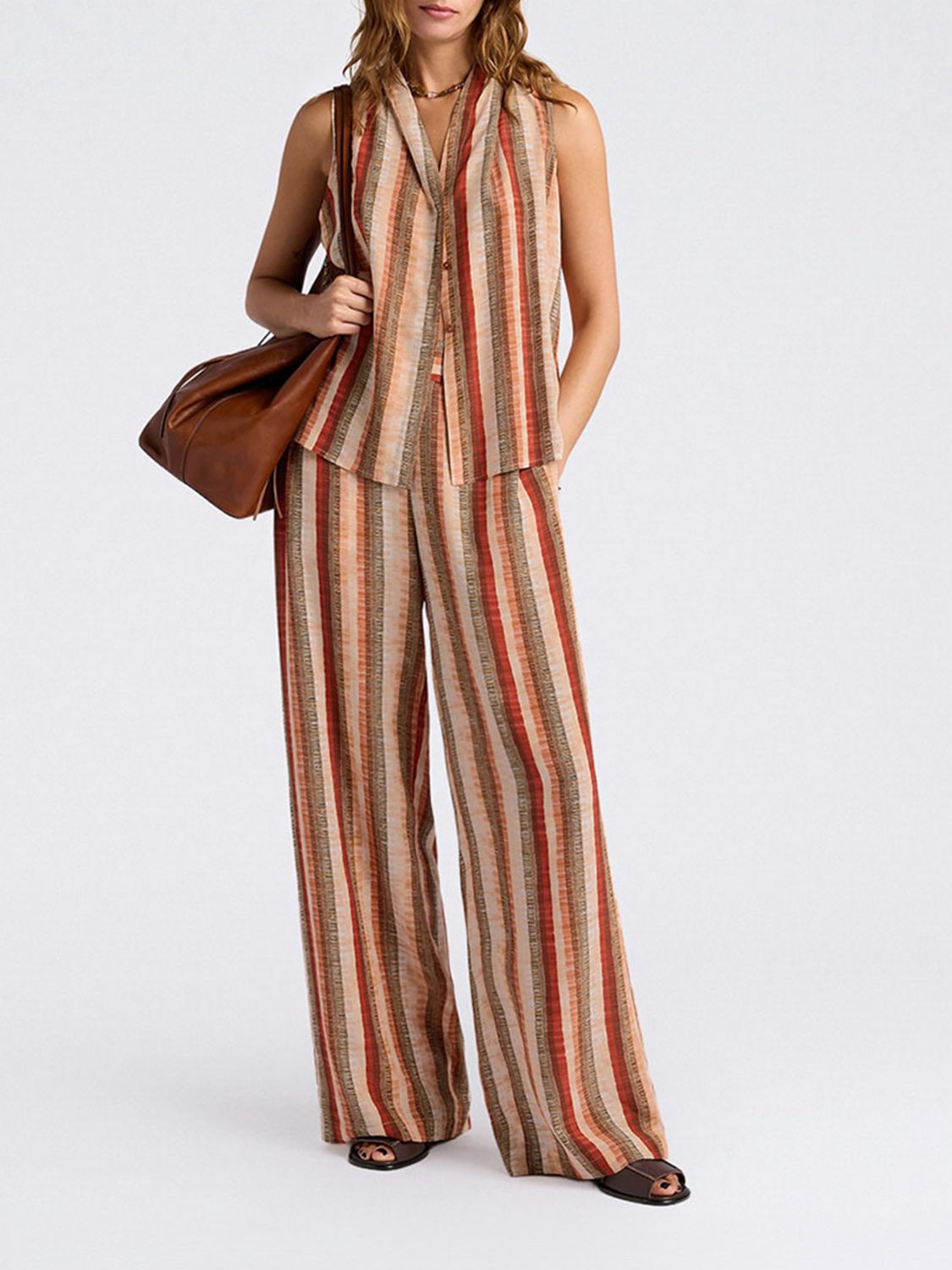MOMONÌ Pants Woman color Orange