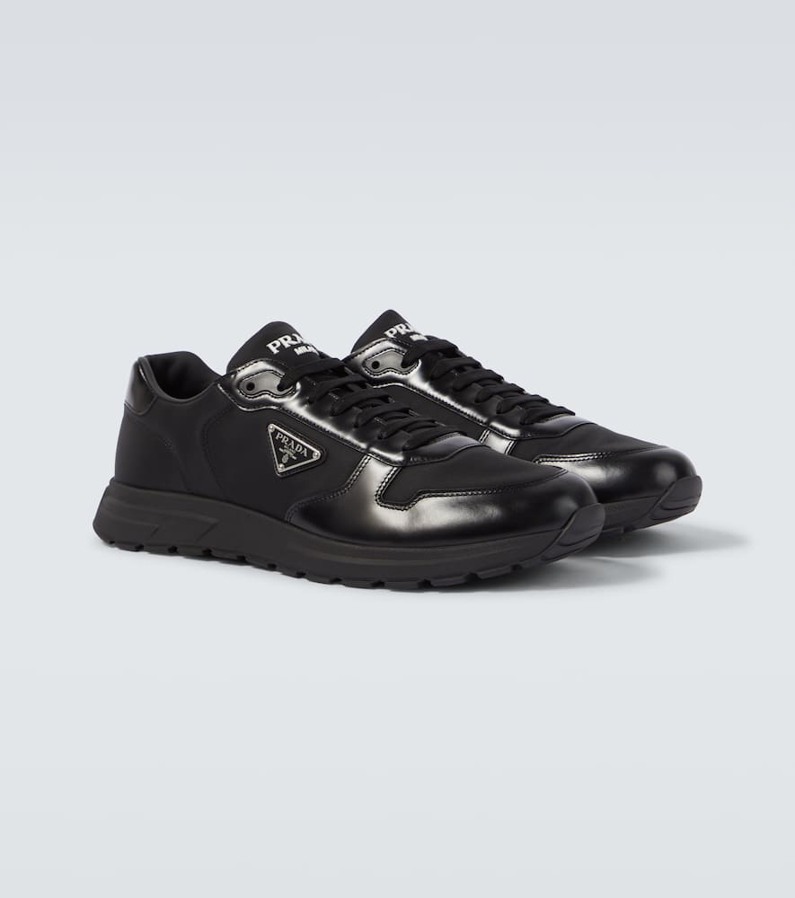 Logo leather-trimmed sneakers