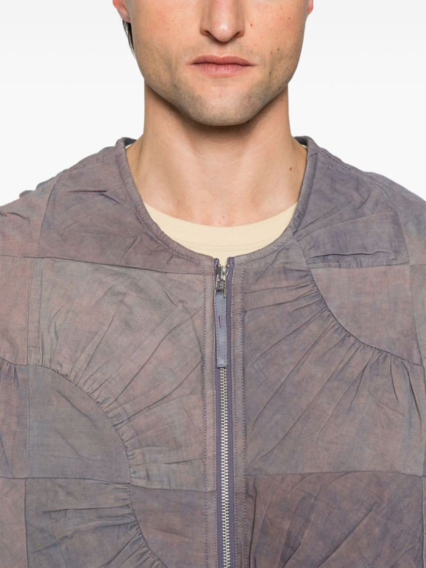 - Pluto Vest