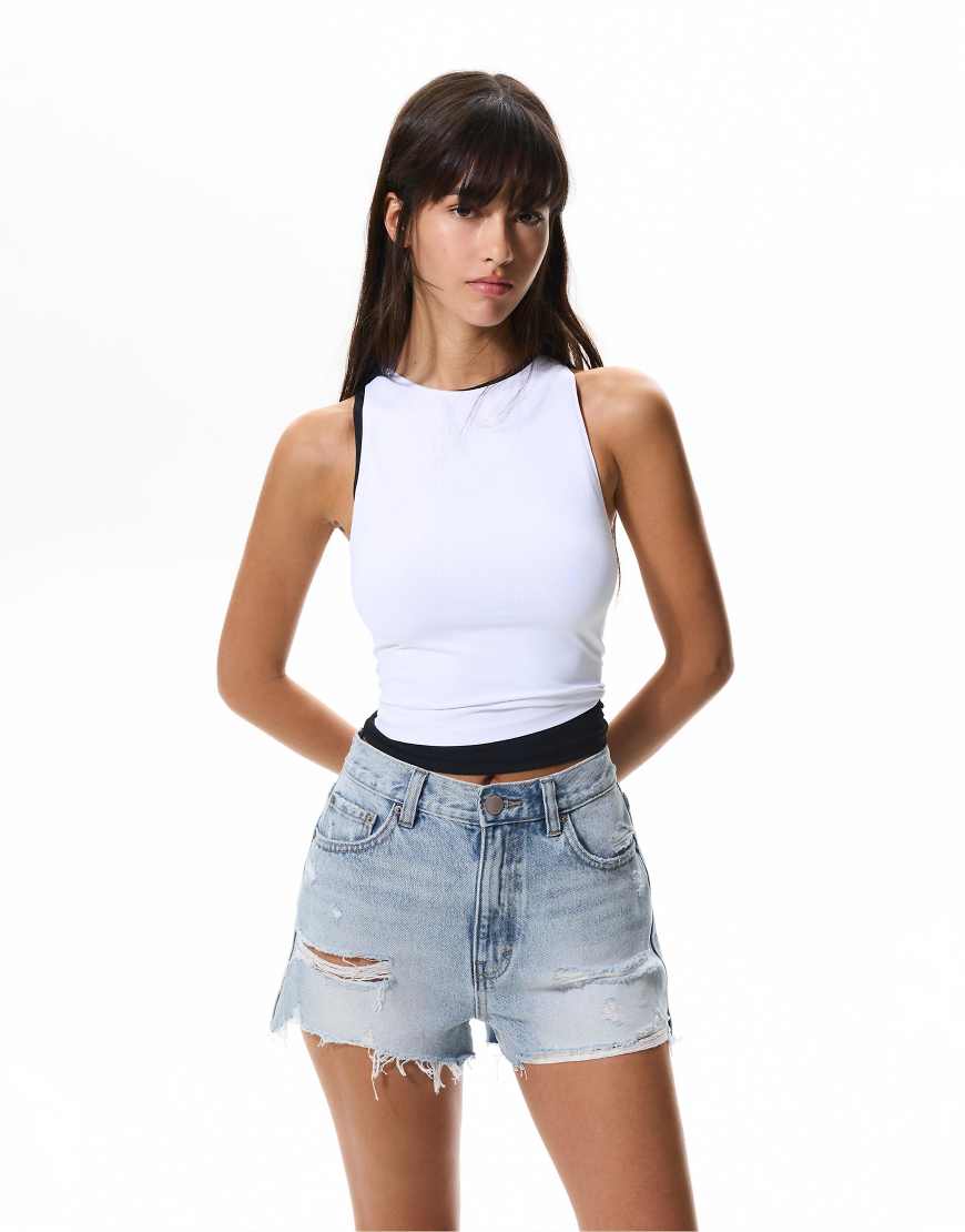 Denim shorts with frayed hems in pale blue