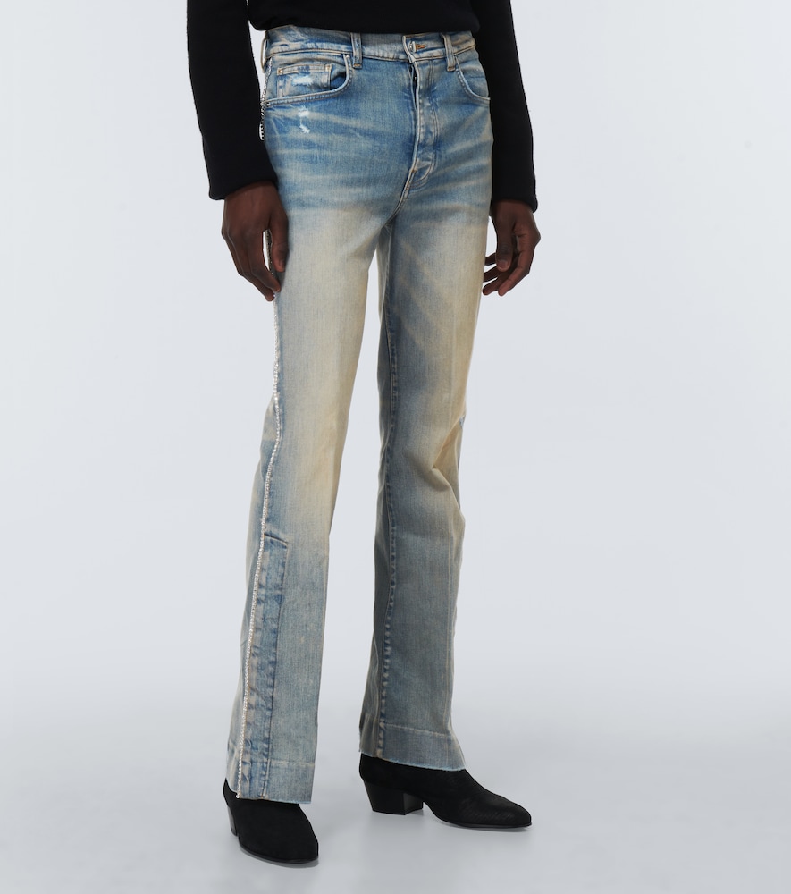 Distressed embellished denim jeans