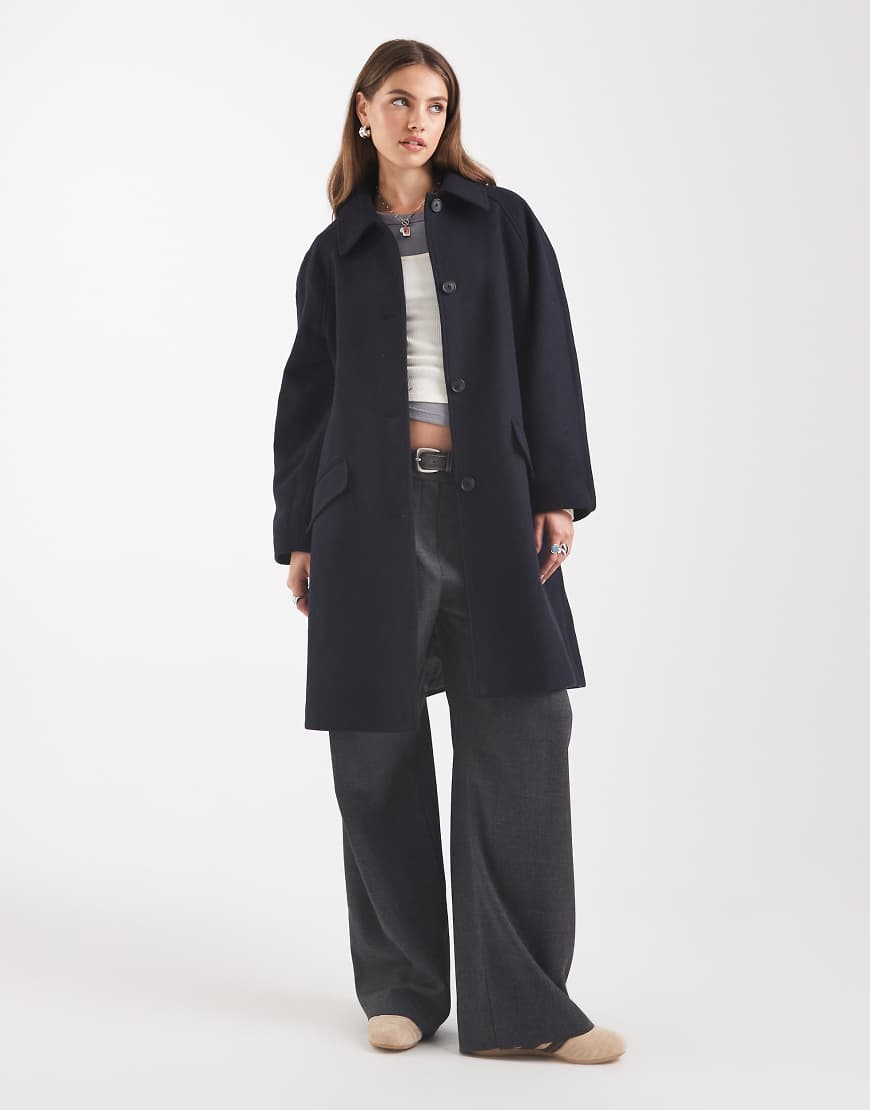 Mid length car coat with quilt lining in navy