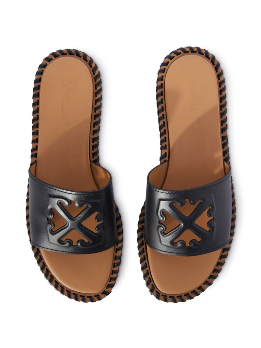 Twist Arrow-embossed leather slides - Black