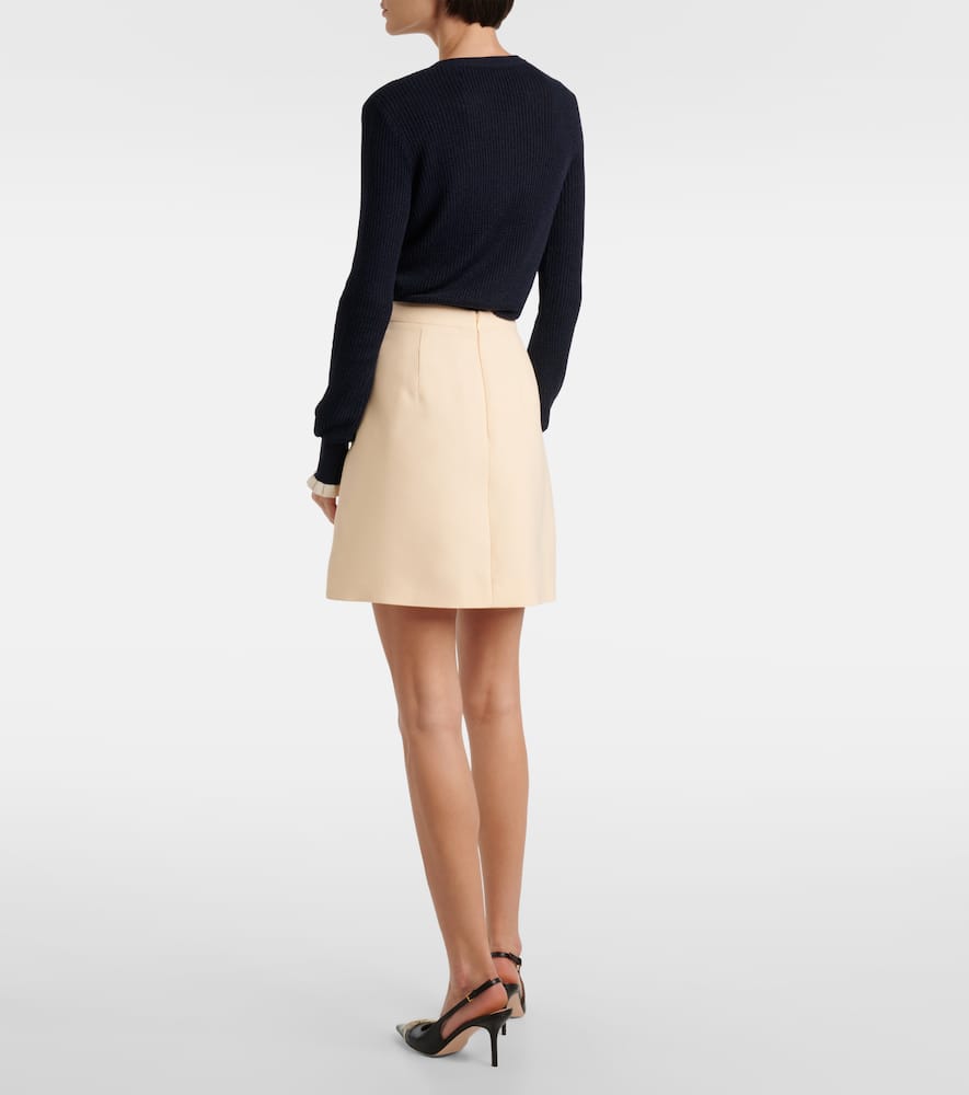 Crepe Couture bow-detail miniskirt