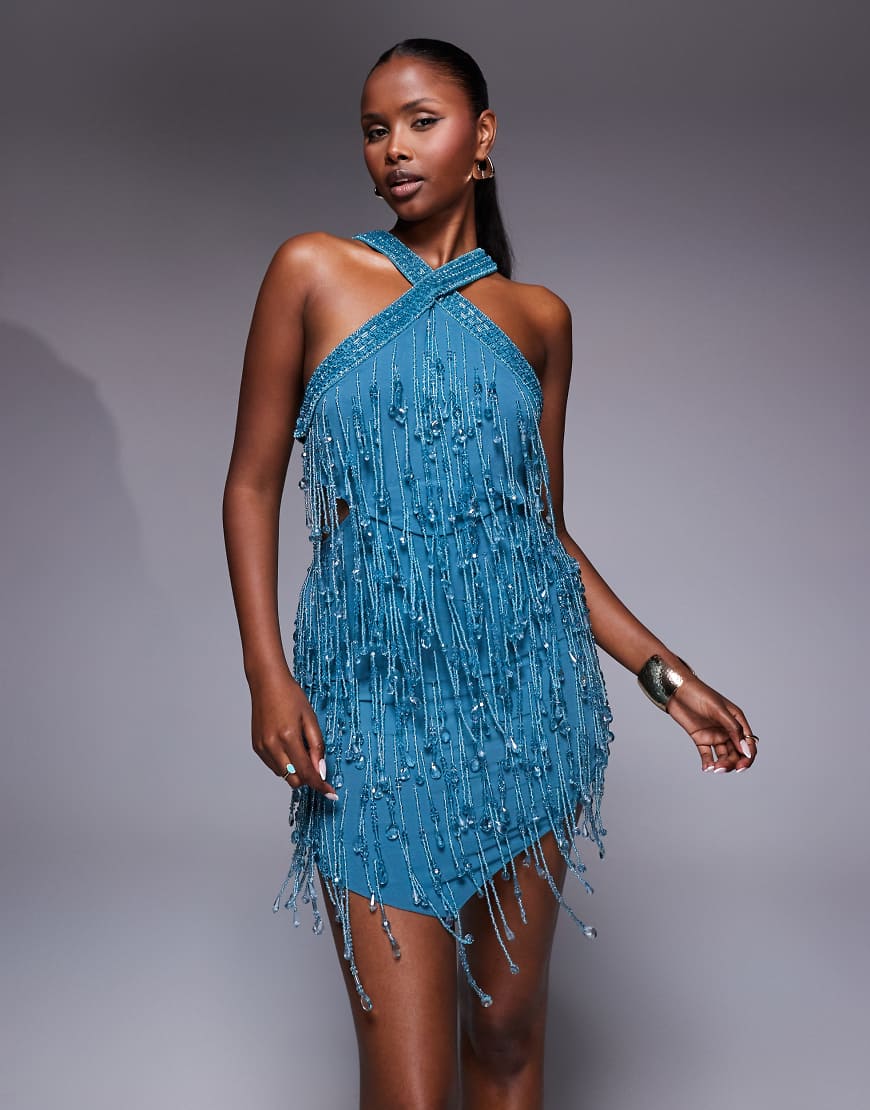 Embellished halter mini dress with cut-out waist and pointed hem in blue