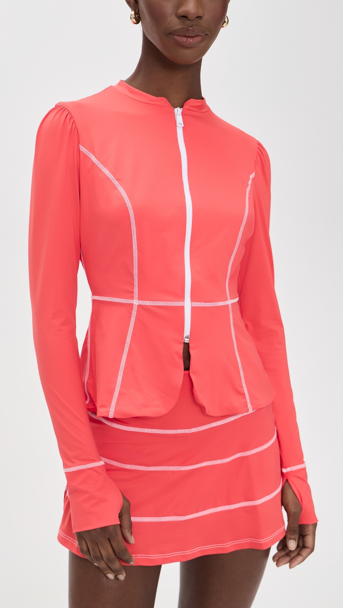 The Alexia Rashguard Top Coral