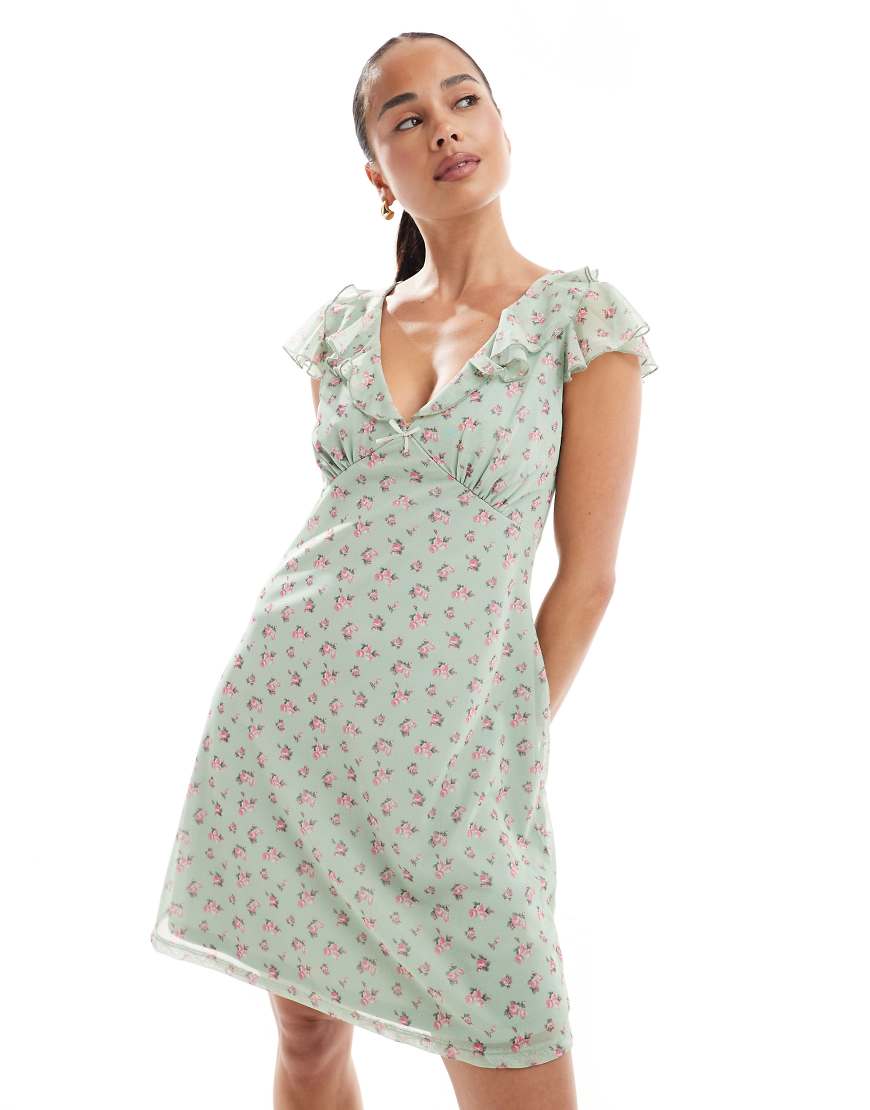 Frill neck mesh mini dress in green floral