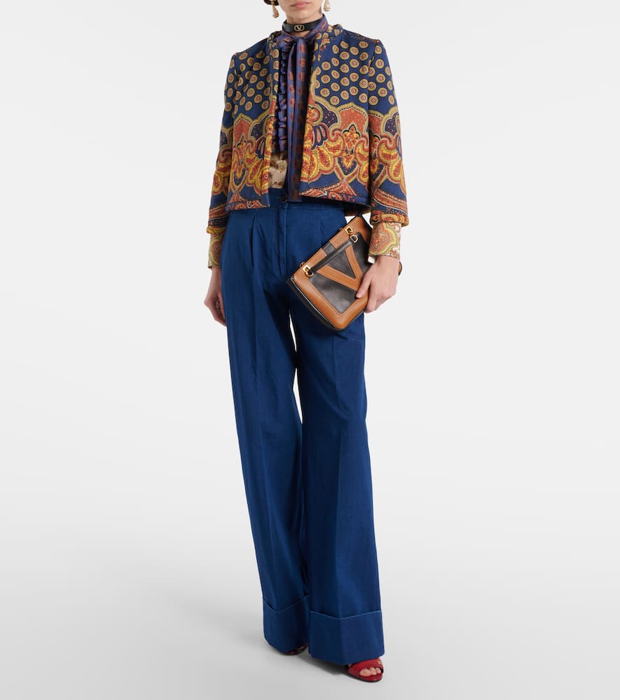 High-rise pleated wide-leg jeans