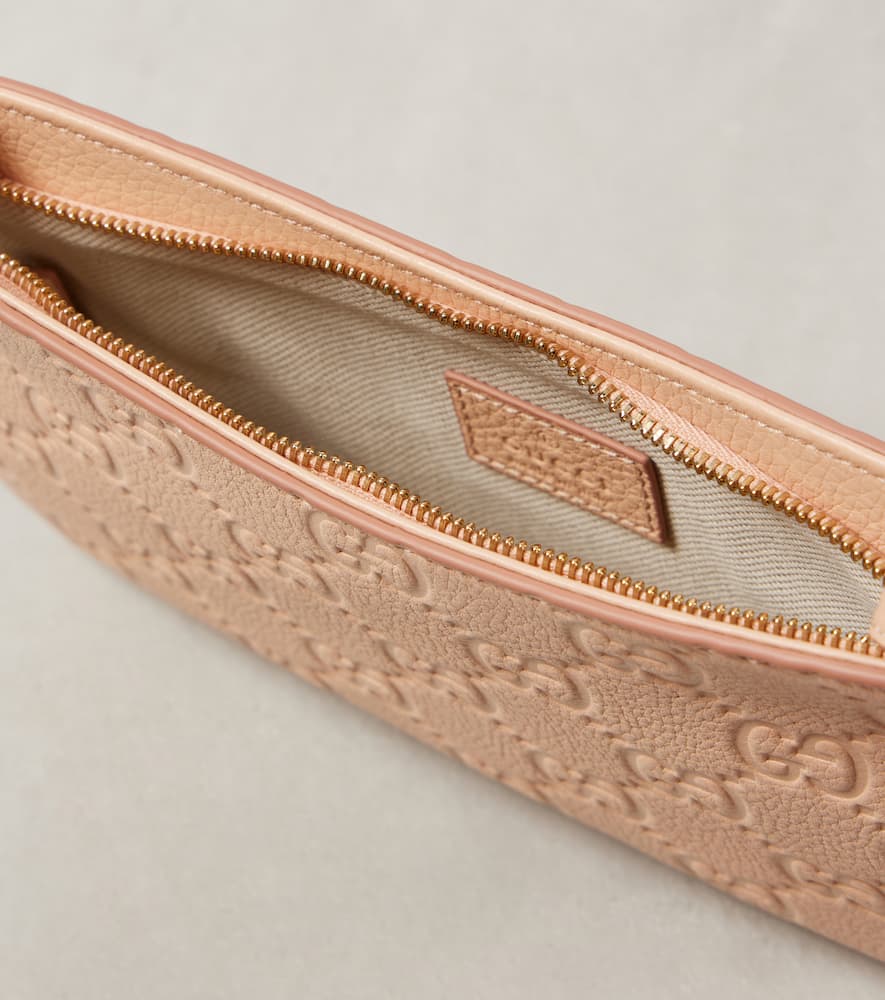 GG Super Mini debossed leather shoulder bag