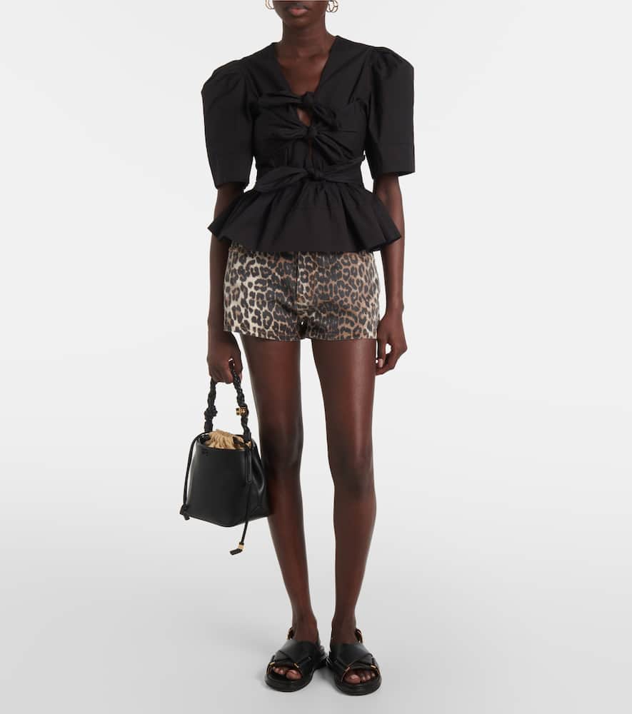 Leopard-print denim shorts