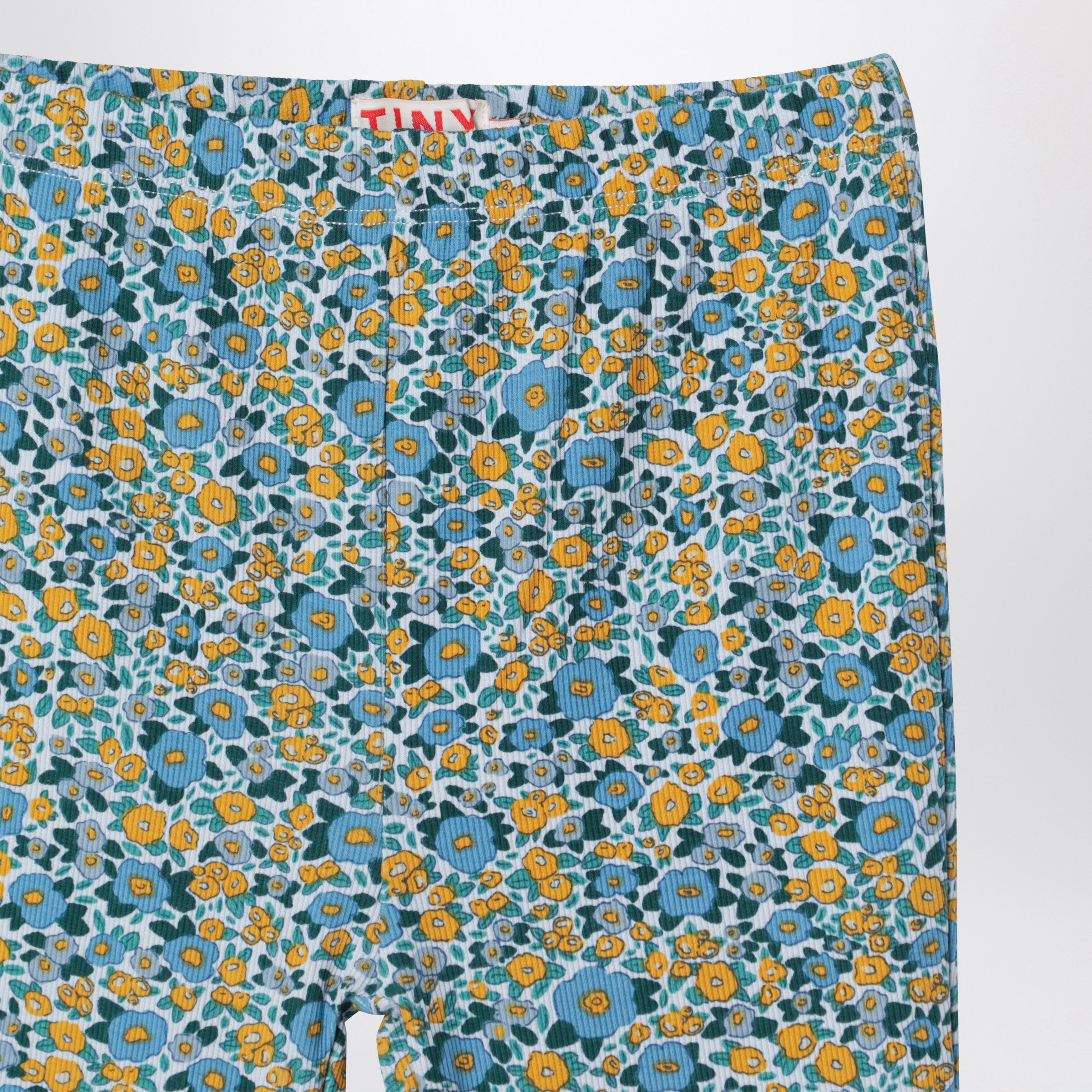 Light blue trousers with floral print in cotton