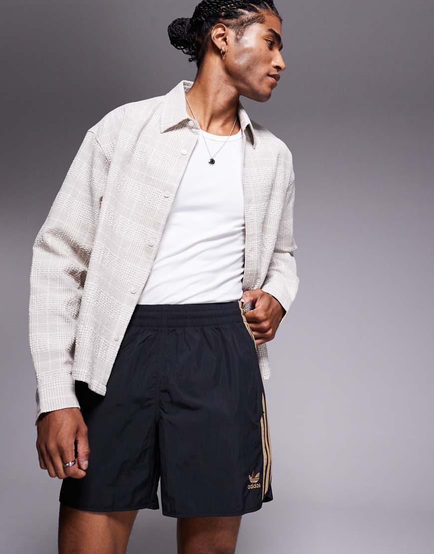 Adicolor sprinter shorts in black and beige