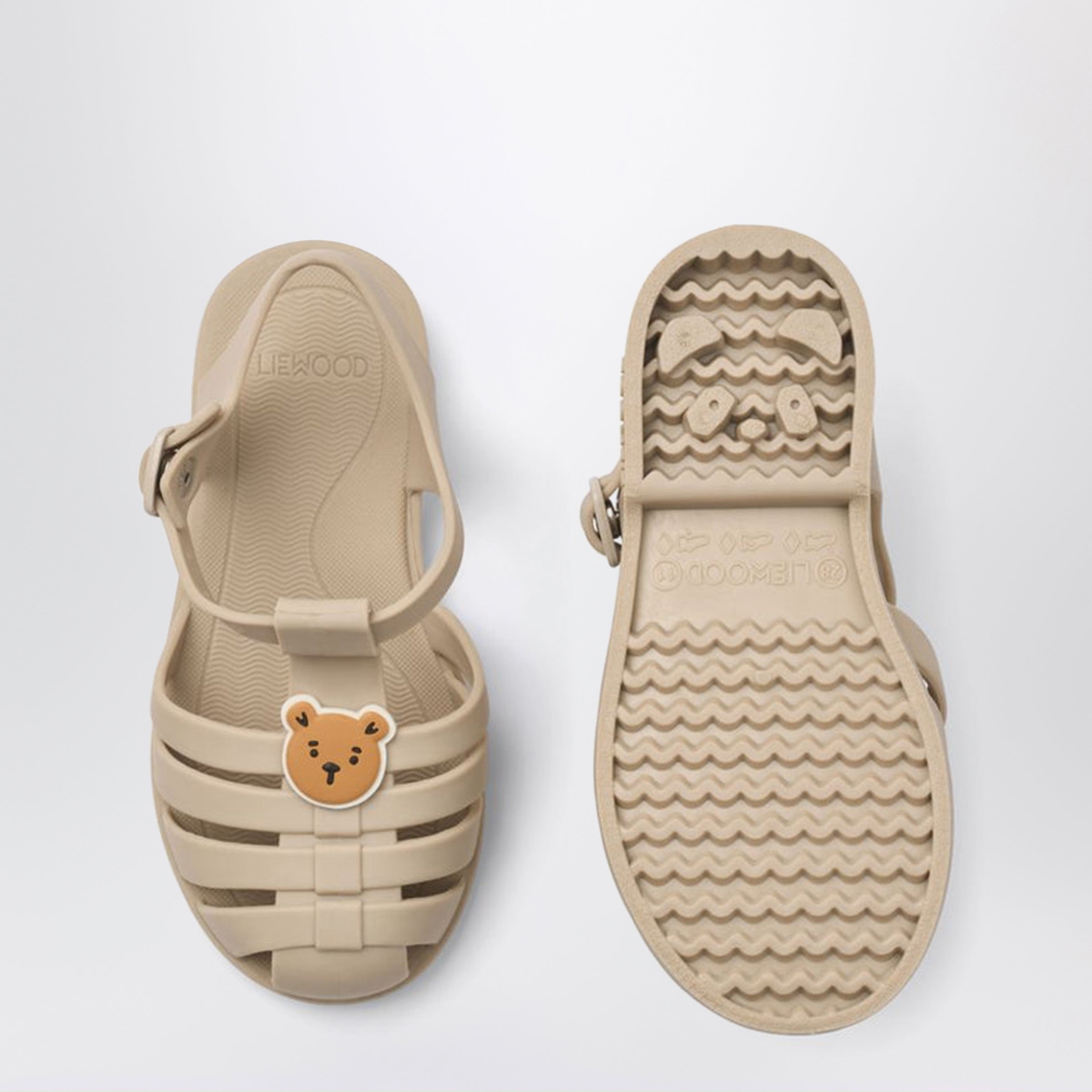 Sand beige Bre sandals with teddy charm