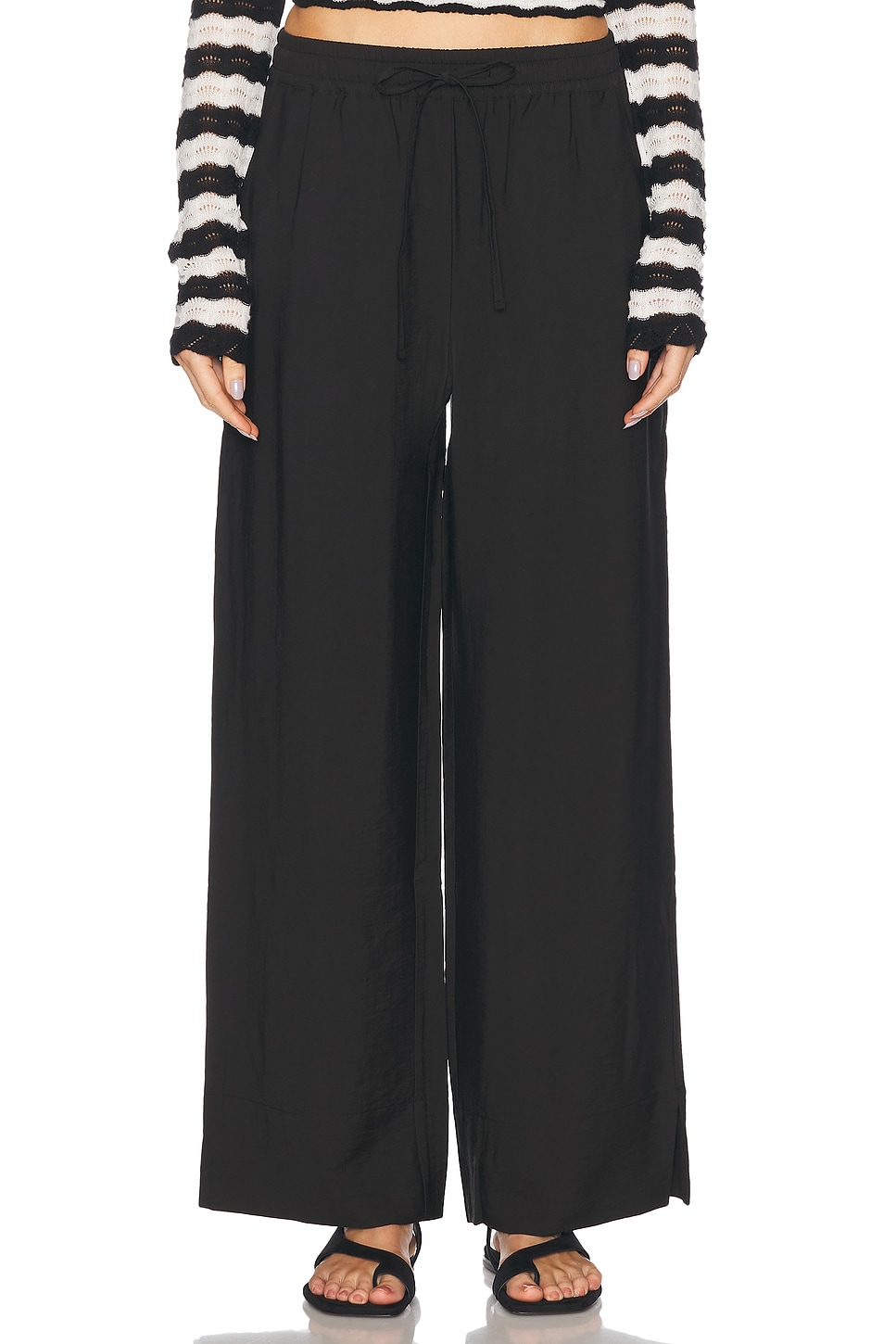 House of Dagmar Drawstring Pant in Black - Black.  40 also in 32
