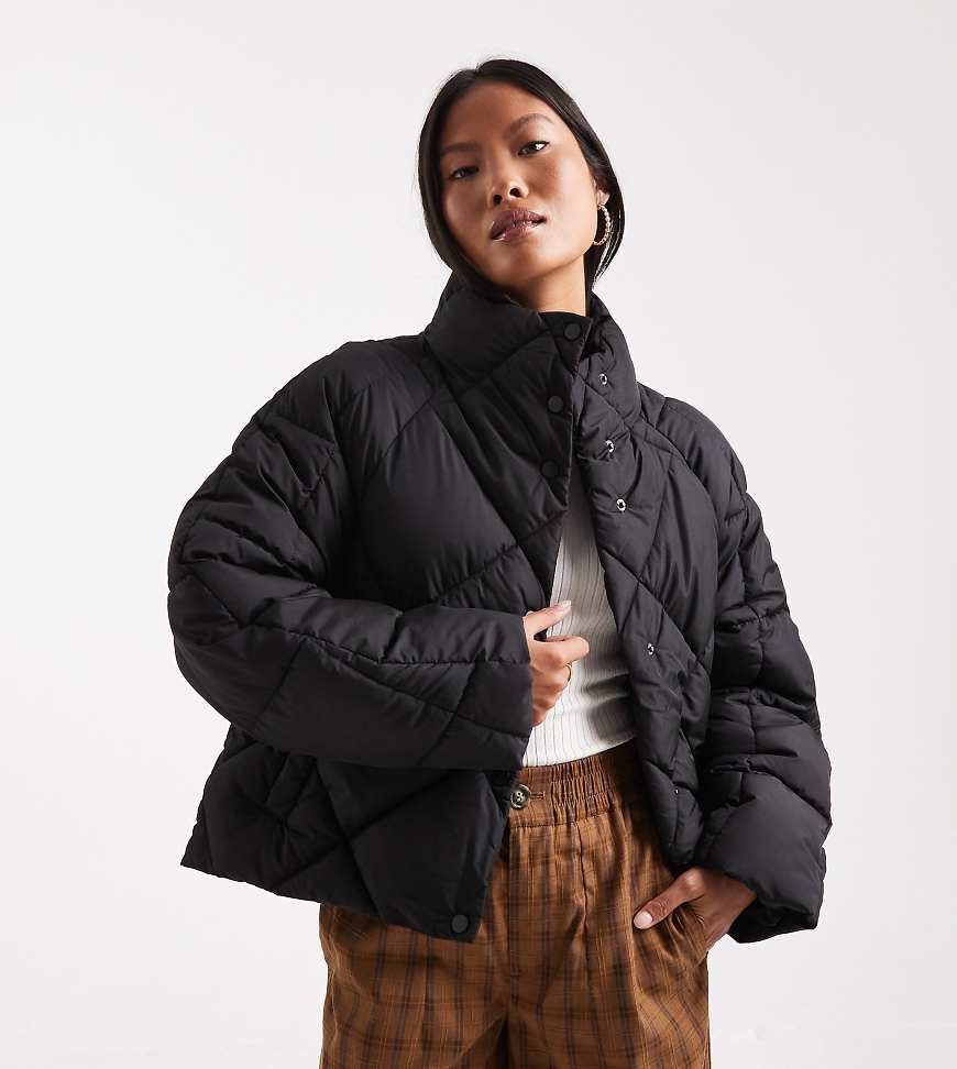 Oversized quilted funnel neck cropped puffer jacket in black