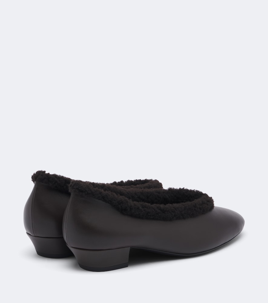 Shearling-lined leather pumps