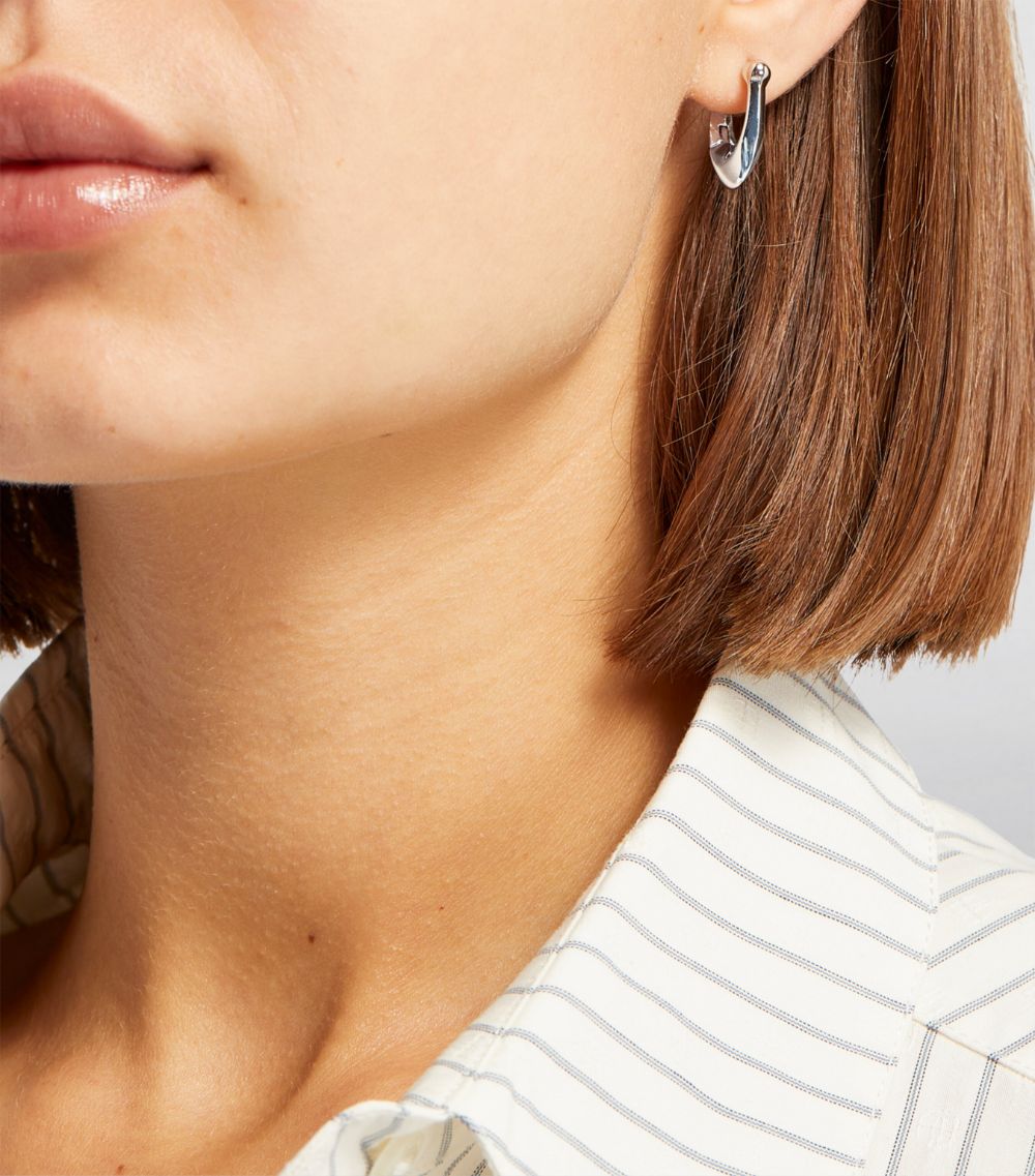Rhodium Signature C Huggie Earrings