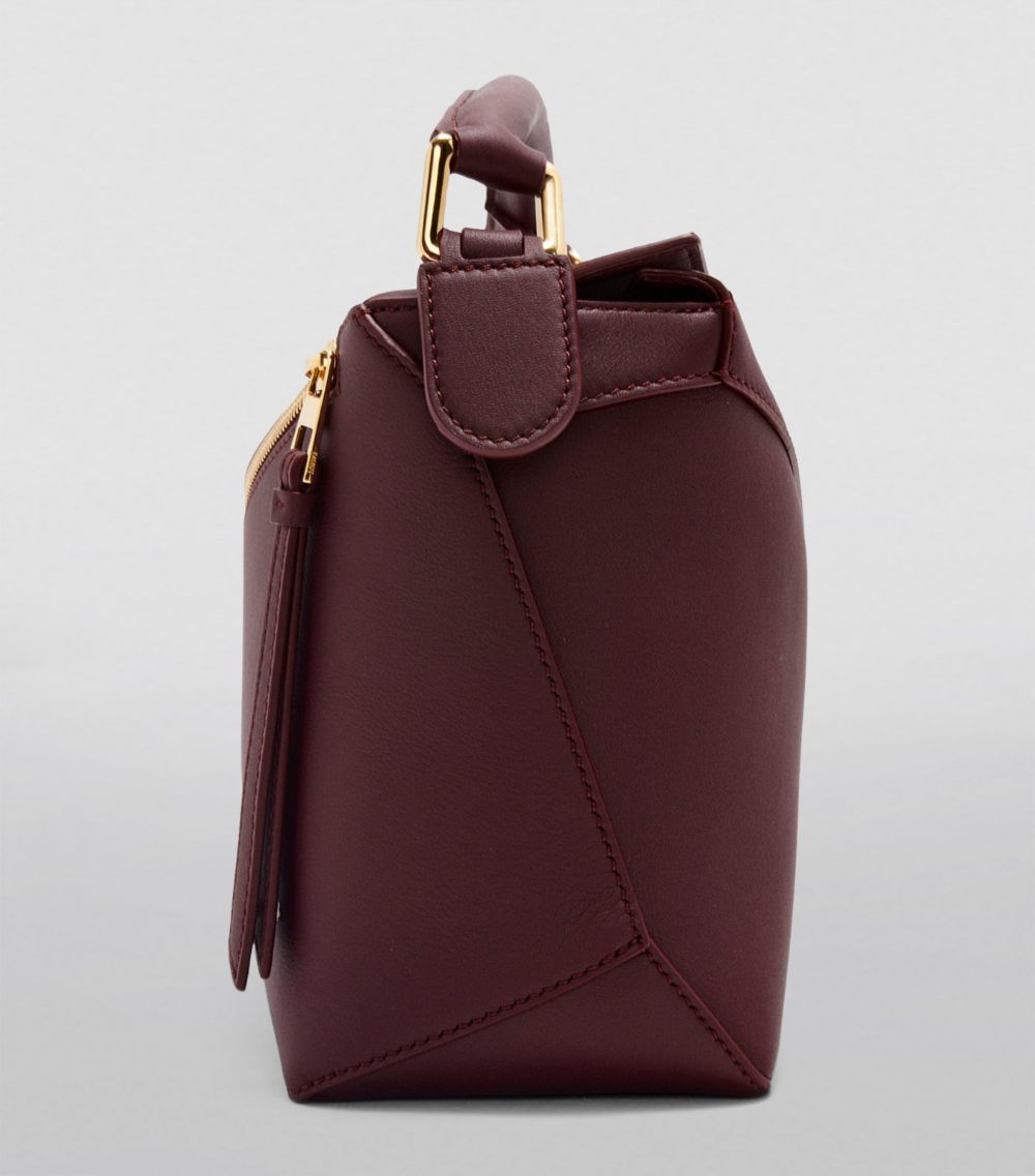 Small Leather Puzzle Edge Top-Handle Bag