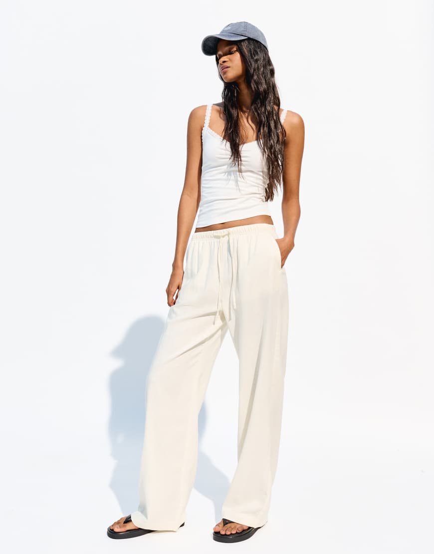 Linen blend trousers with an elasticated waistband in yellow