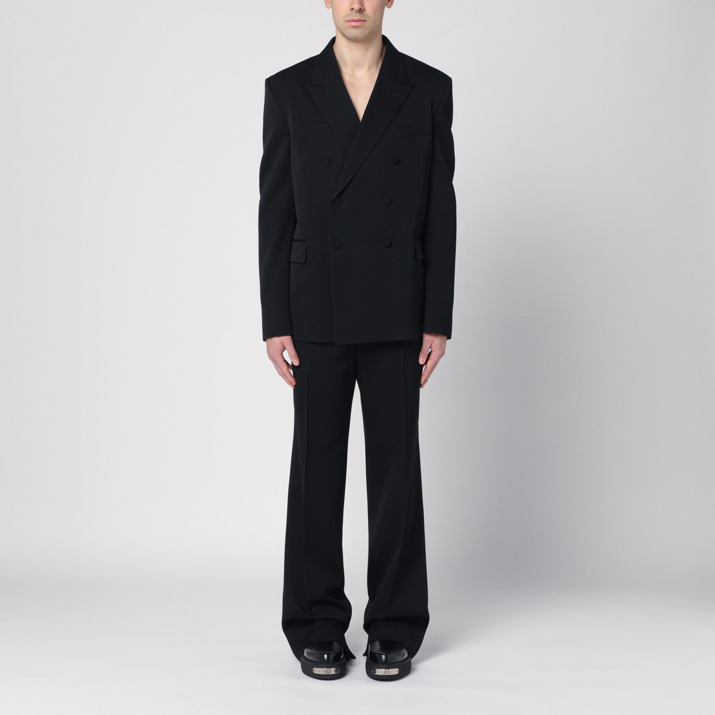 Black double-breasted wool suit