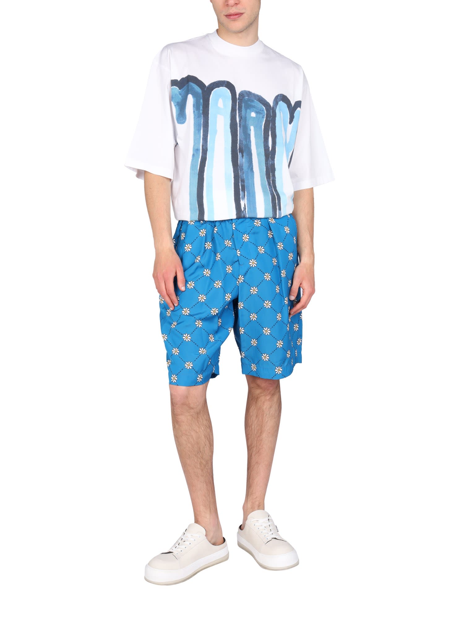 Daisy-print track shorts