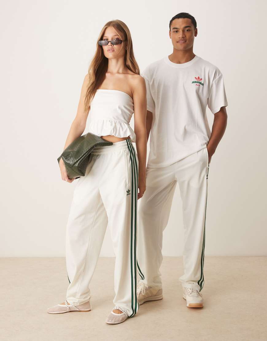 Firebird track pants in cream and green