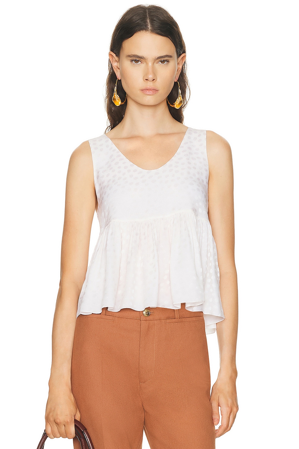 Chloe Peplum Tank Top in Iconic Milk - White. 38 also in