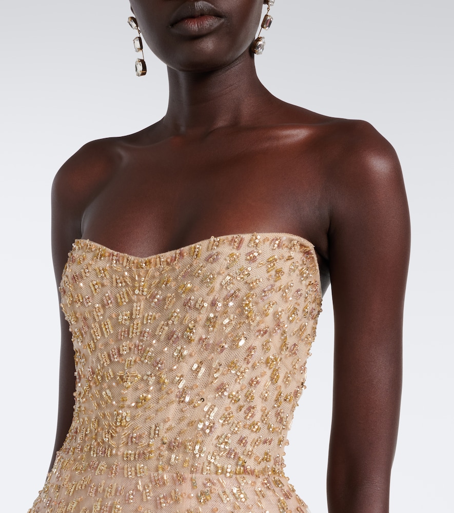 Embellished peplum bustier gown