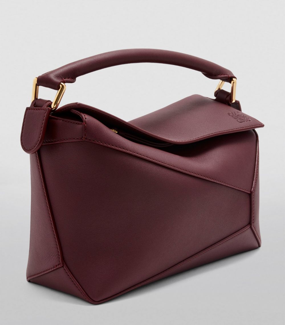 Small Leather Puzzle Edge Top-Handle Bag