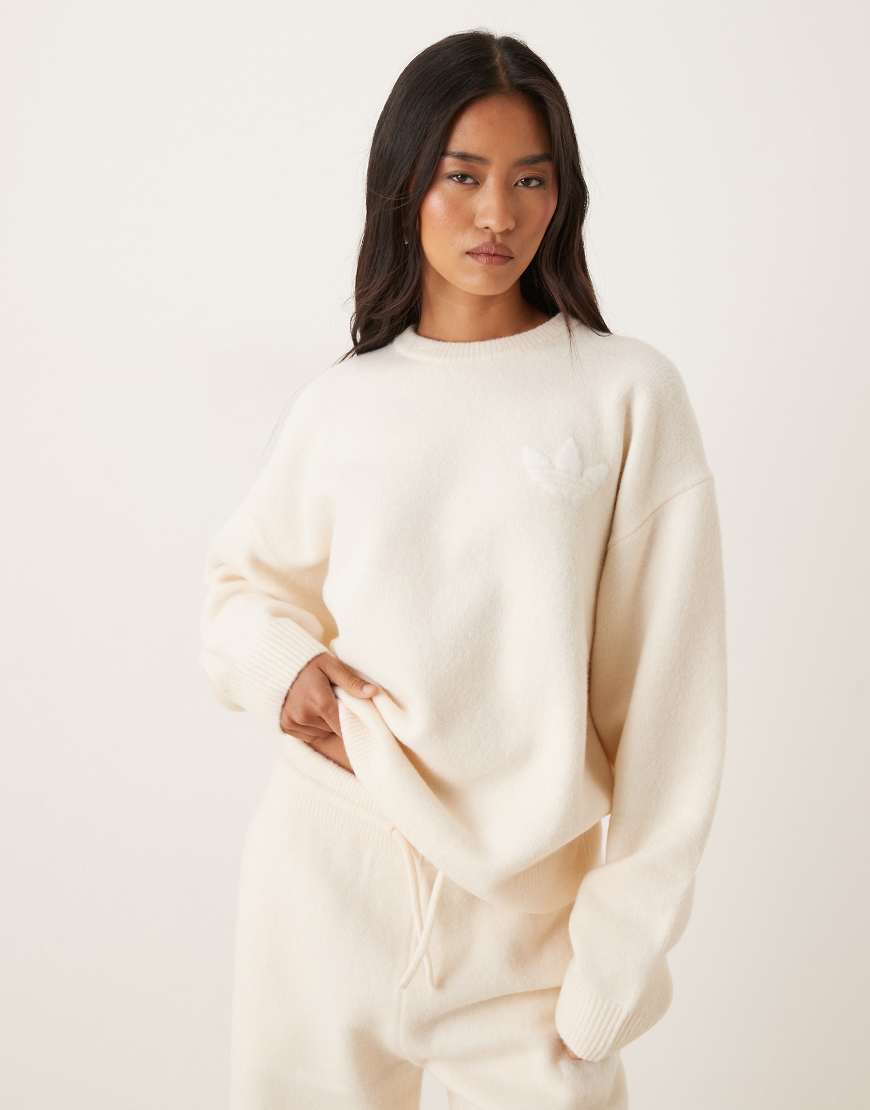 Knitted jumper in cream-White